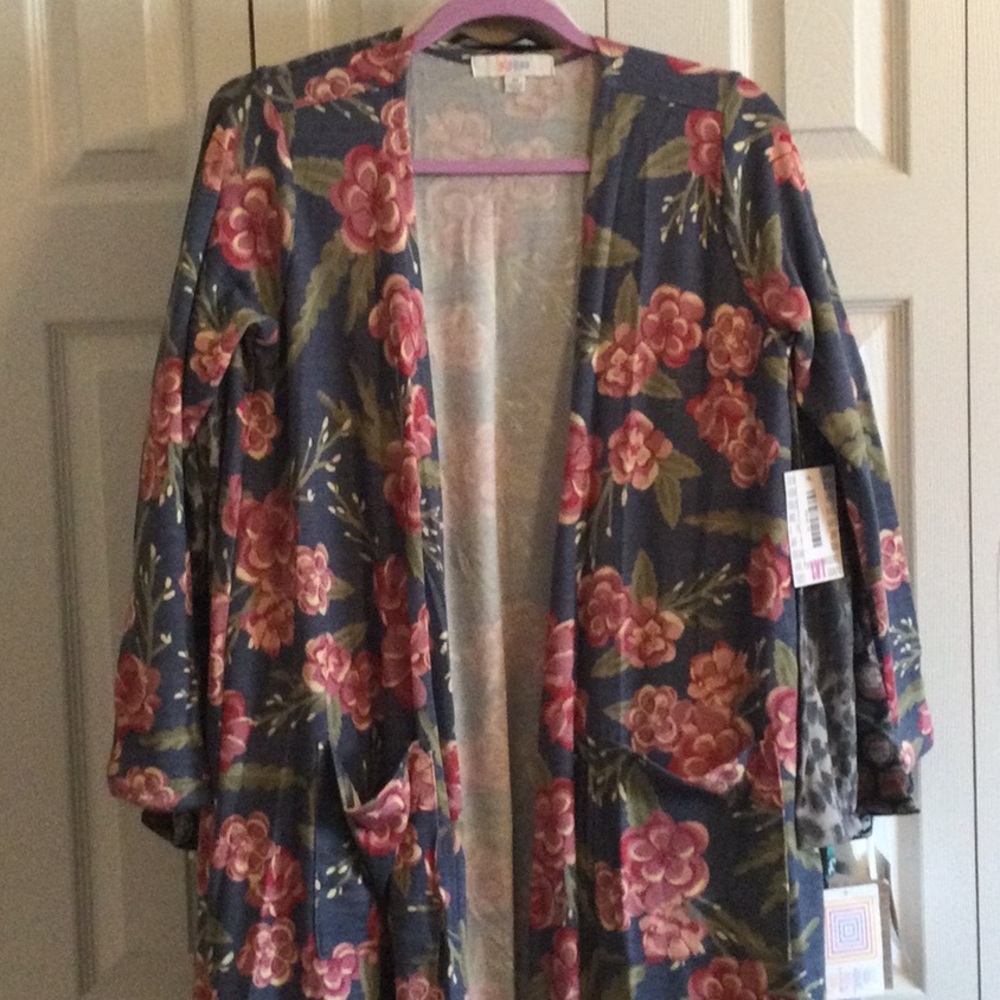 NWT Lularoe Sarah Sweater, size Medium. Blue with floral pattern